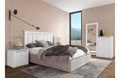 Dormitorio de matrimonio en blanco y gris.